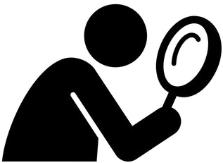 Man Inspecting Magnifier